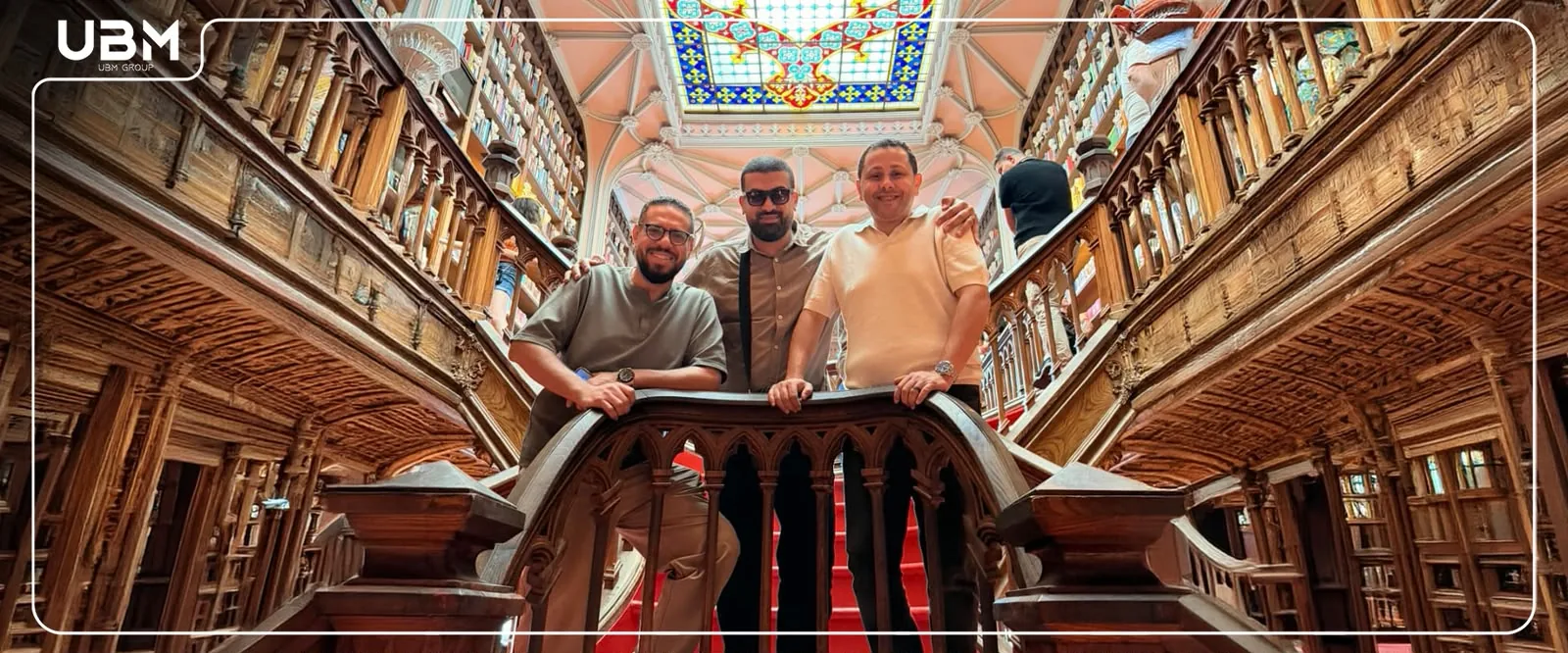 UBM team members exploring a historic Porto library